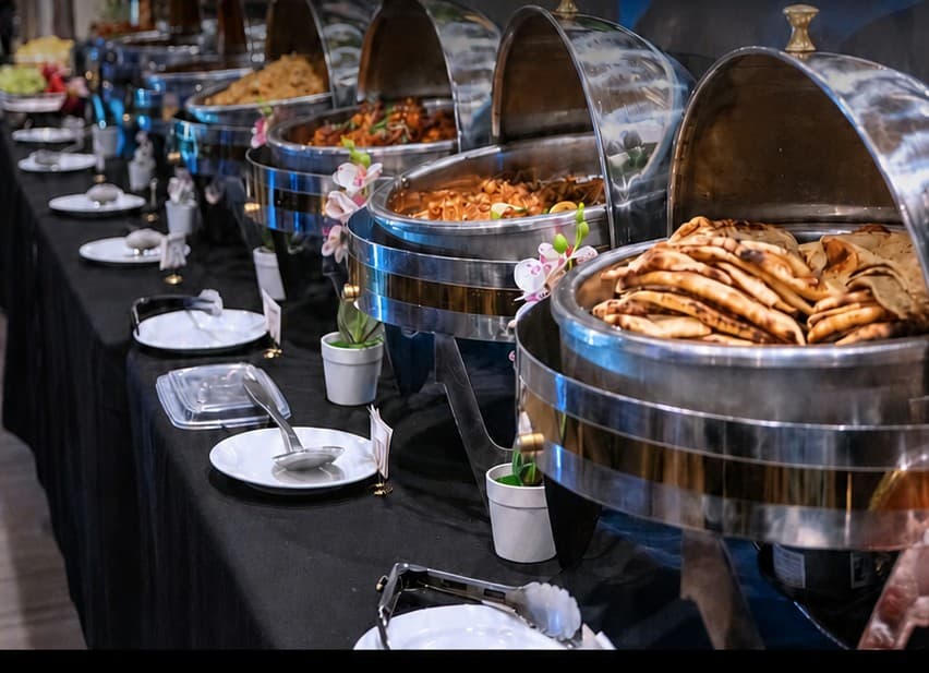 Buffet chafing-dish setup for a catered event at Karakoram Restaurant